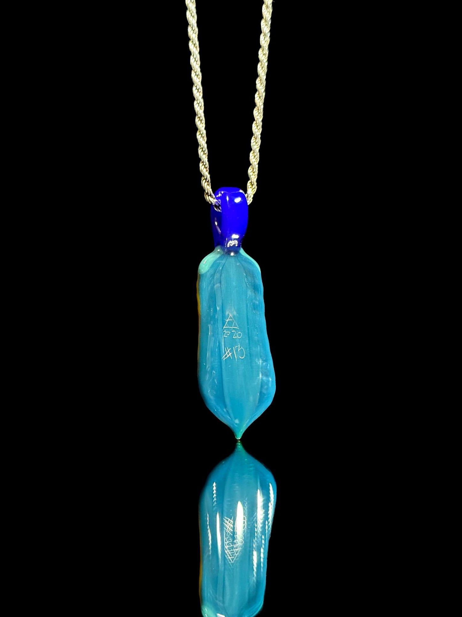 Trip A Glass Coogi Feather Pendant