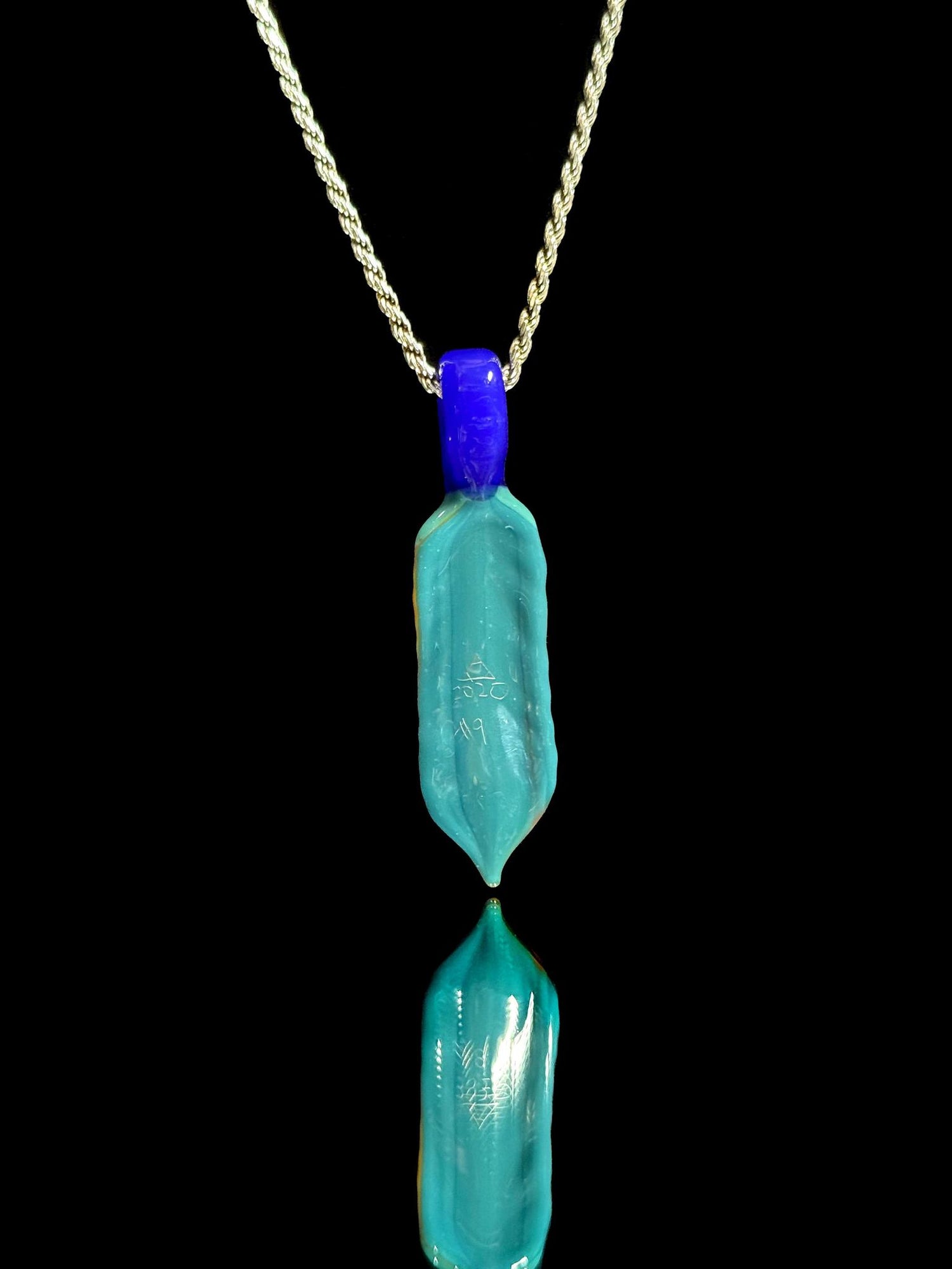 Trip A Glass Coogi Feather Pendant