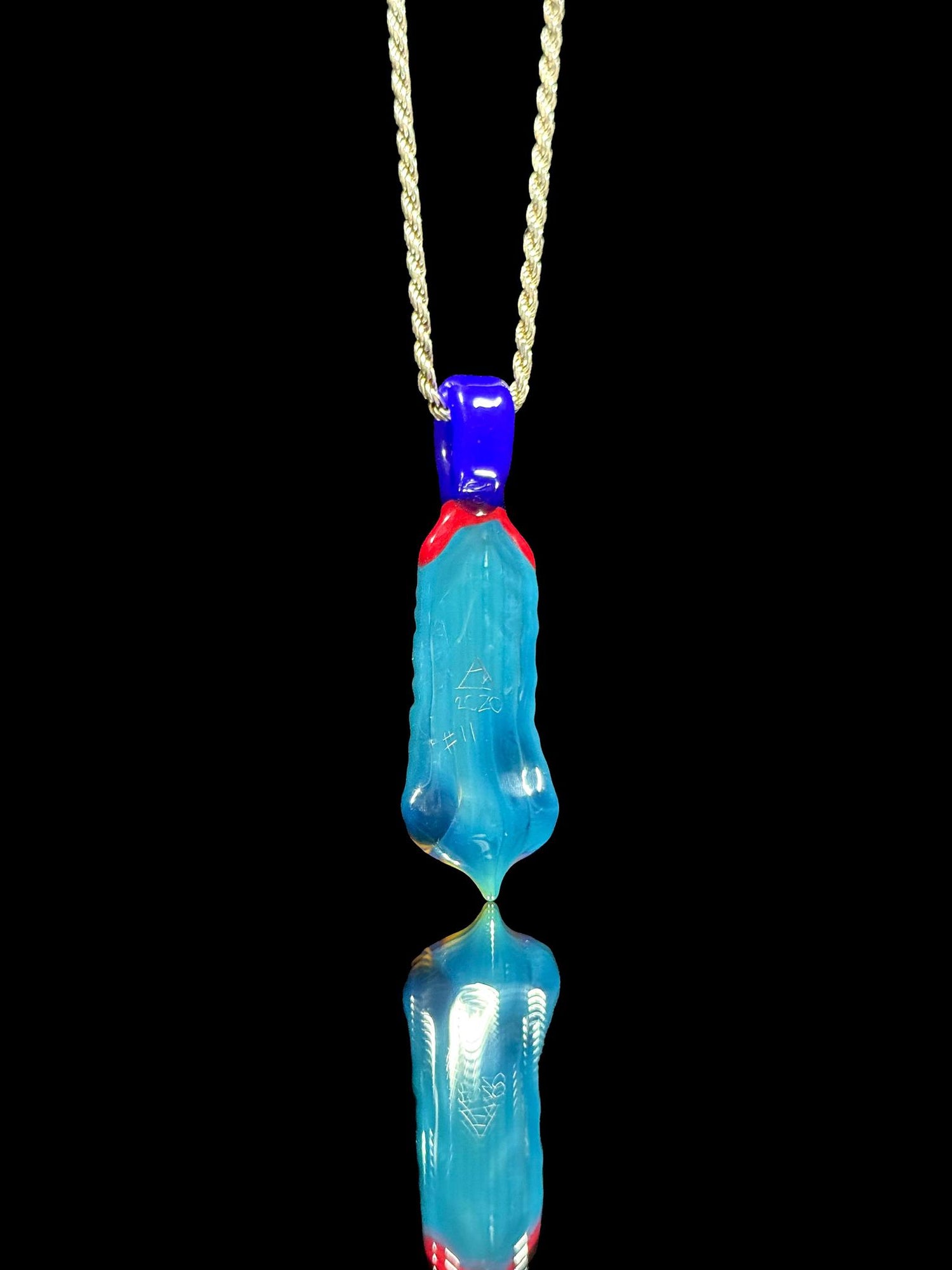 Trip A Glass Coogi Feather Pendant